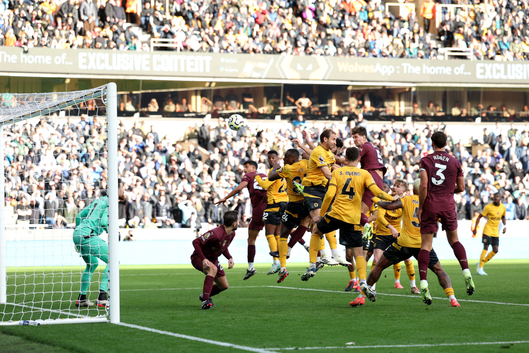 Stones bags controversial winner as Man. City survive Wolves scare